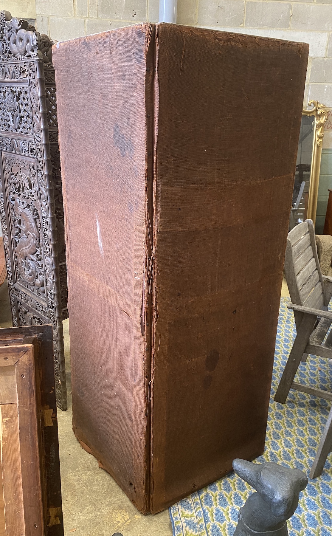 A Victorian painted canvas two fold dressing screen decorated with cherubs amongst scrolls, each panel width 66cm, height 184cm